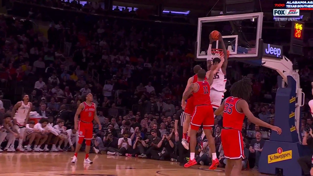 Samson Johnson catches a FEROCIOUS two-handed alley-oop to extend UConn's lead over St. John's