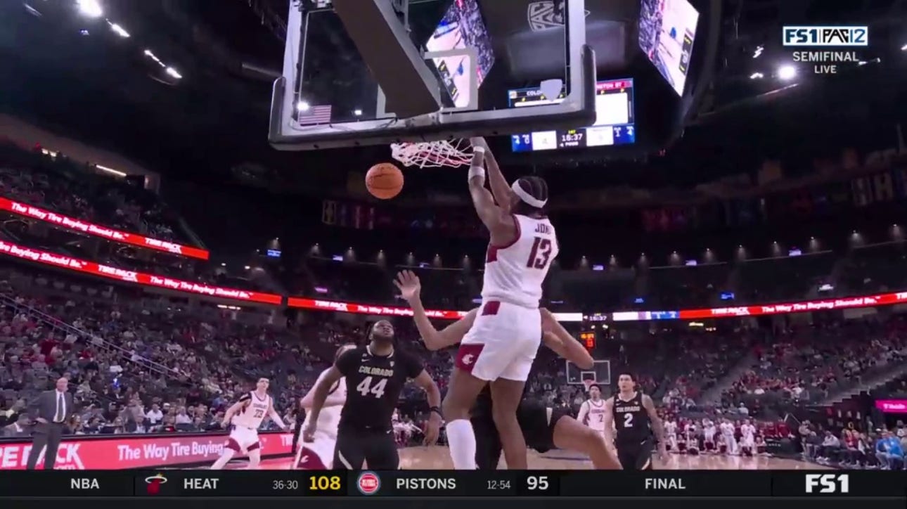 Isaac Jones throws down a two-handed slam to give Washington State an early lead over Colorado