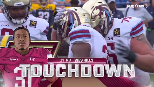 Wes Hills punches it in for a two-yard touchdown to give the Panthers an early lead vs. Showboats