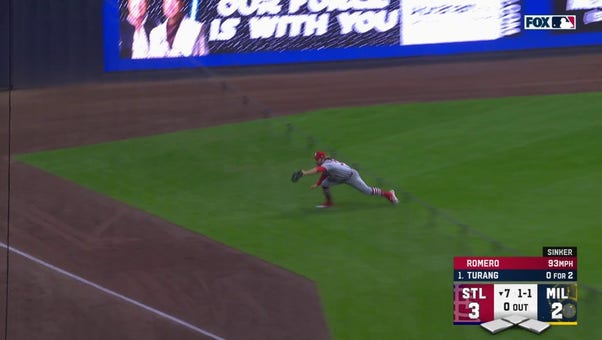 Brendan Donovan dives for the catch, helping maintain Cardinals lead over Brewers