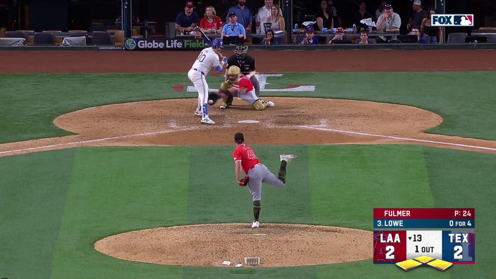 Nathaniel Lowe gets plunked with bases loaded, walking in the winning run for the Rangers 