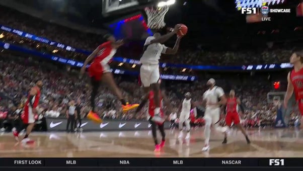 Anthony Edwards finishes an acrobatic layup, shrinking United States' deficit against Canada