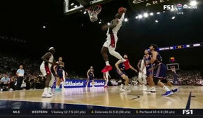 LeBron James throws down a vicious one-handed dunk off the lob from Bam Adebayo