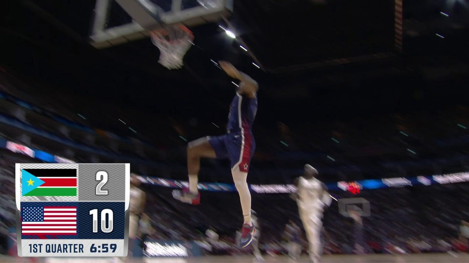 America's LeBron James performs a tomahawk dunk in the match against South Sudan