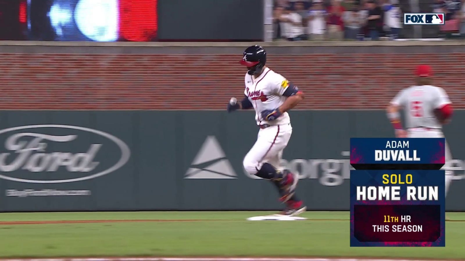 Adam Duvall crushes a solo home run, extending the Braves' lead over the Phillies