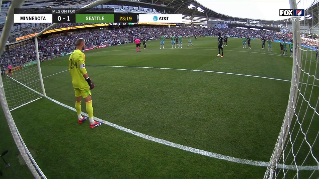 Minnesota's Kelvin Yeboah scores on a penalty kick to even the score against Seattle