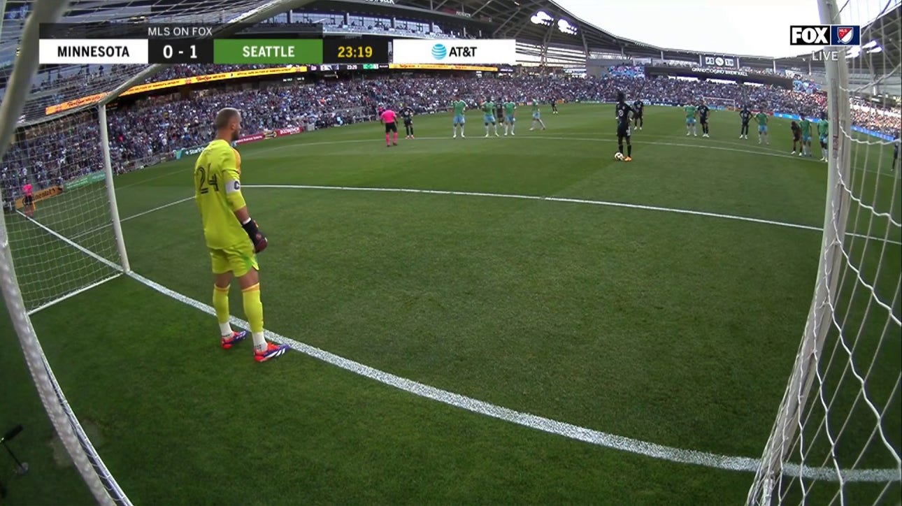 Minnesota's Kelvin Yeboah scores on a penalty kick to even the score against Seattle