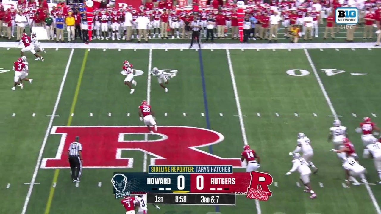 Rutgers' Eric Rogers intercepts Howard's Ja'Shawn Scroggins for a touchdown and a 7-0 lead