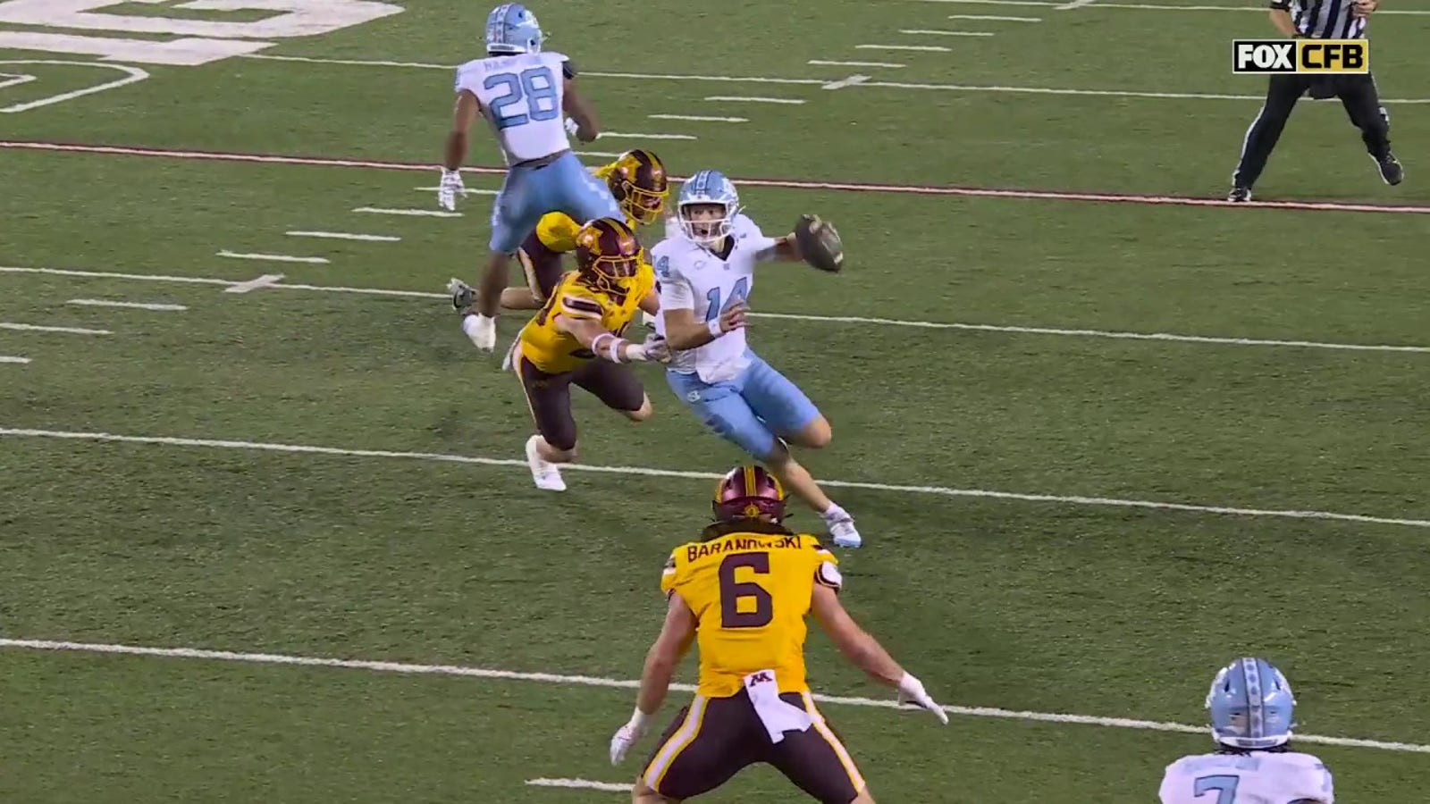 North Carolina's Max Johnson rushes for a three-yard touchdown vs. Minnesota