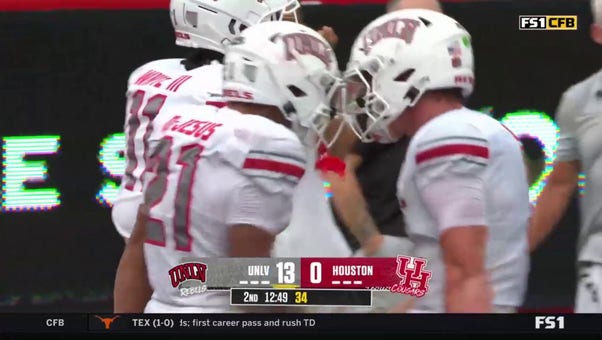 UNLV's Jacob De Jesus scores his second touchdown of the game to extend the lead against Houston