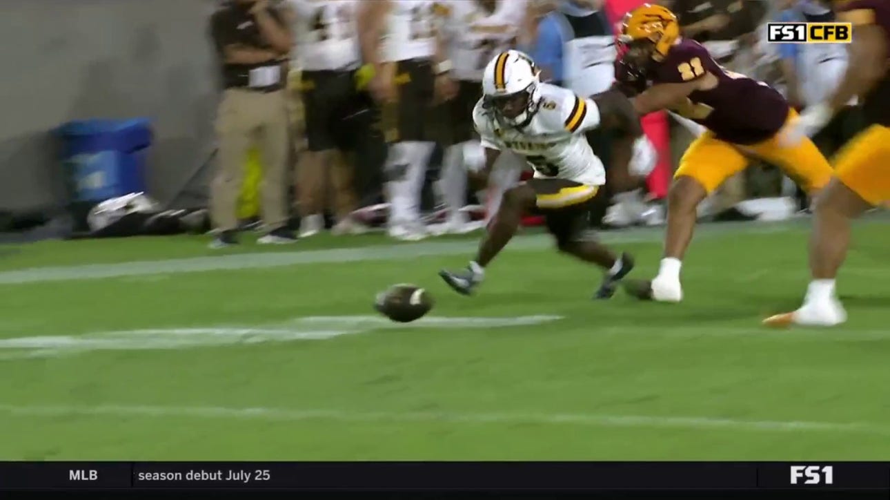 Justin Wodtly recovers Wyoming's fumble for the scoop and score, extending Arizona State's lead