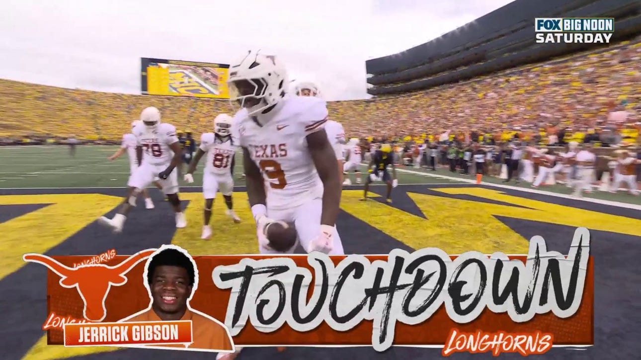 Jerrick Gibson punches in a seven-yard touchdown rush, extending Texas' lead over Michigan