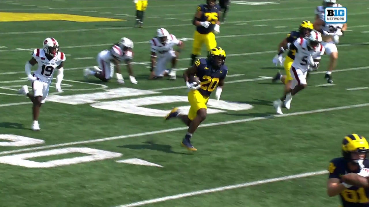 Michigan's Kalel Mullings rushes for a 30-yard touchdown vs. Arkansas State