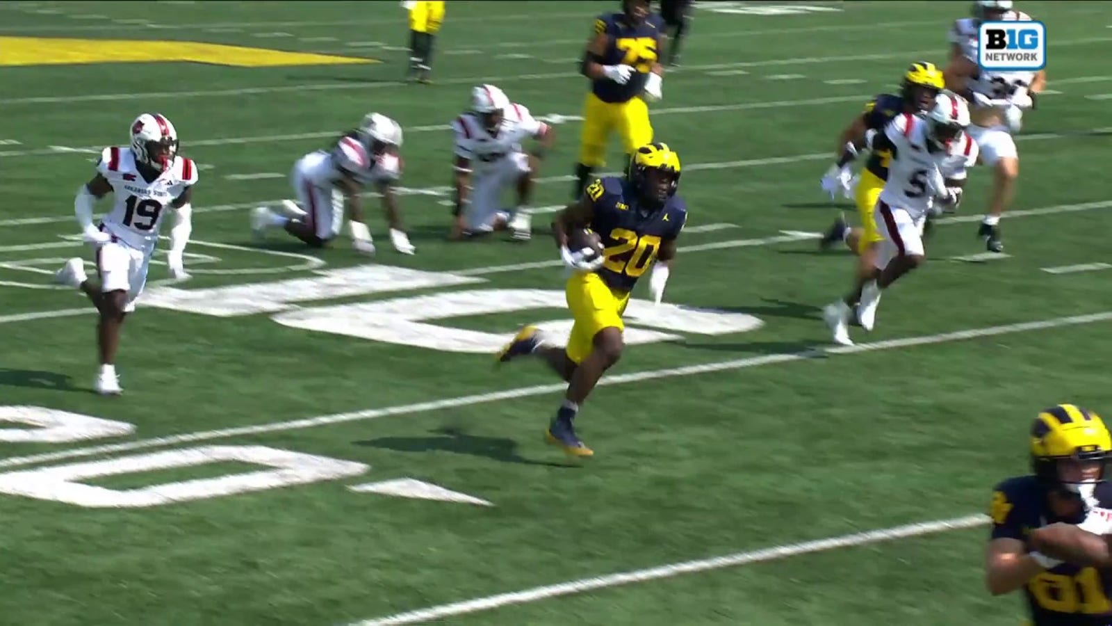 Michigan's Kalel Mullings rushes for a 30-yard touchdown vs. Arkansas State