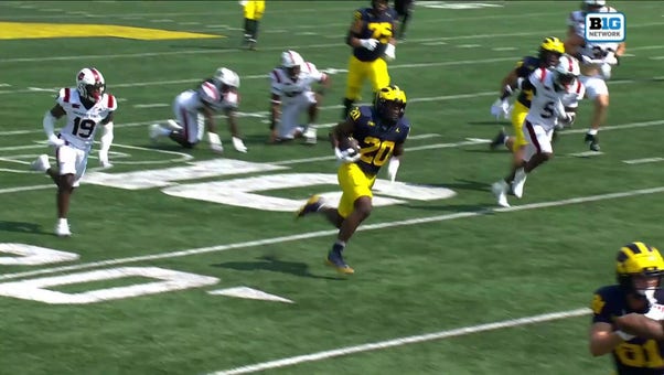 Michigan's Kalel Mullings rushes for a 30-yard touchdown vs. Arkansas State