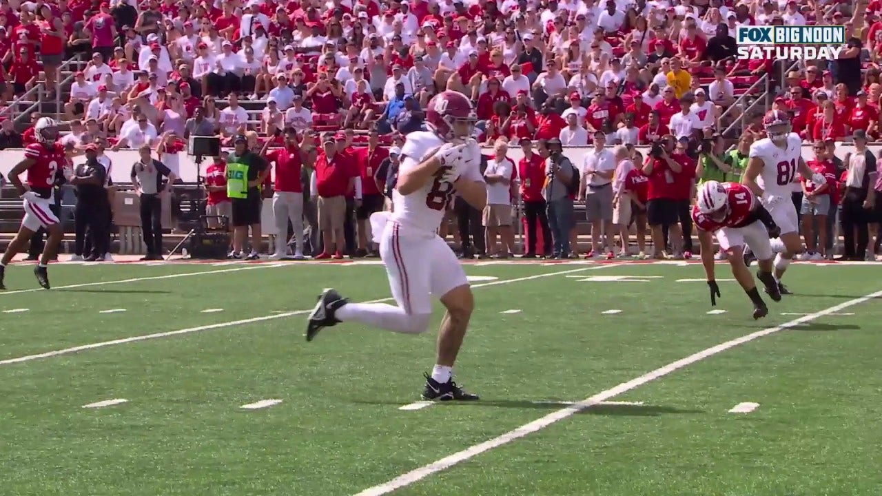 Alabama's Jalen Milroe connects with Josh Cuevas for a 37-yard touchdown vs. Wisconsin