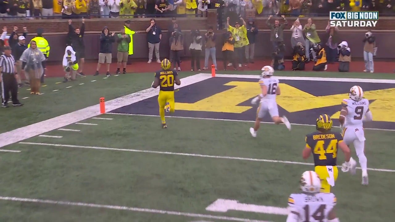 Michigan's Kalel Mullings rushes for a 27-yard touchdown vs. Minnesota