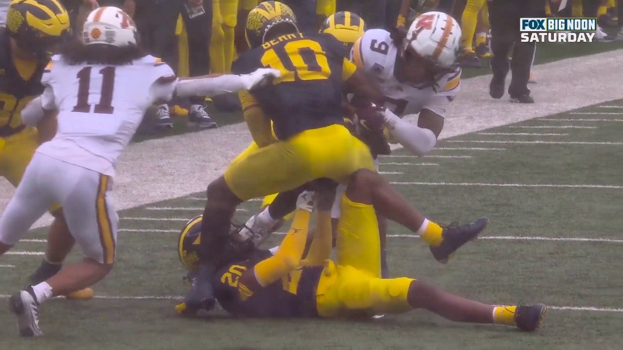 Michigan's Kalel Mullings scores after Zeke Berry's strip fumble