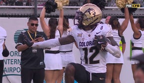 Colorado's Travis Hunter hauls in an UNREAL interception, strikes Heisman pose 