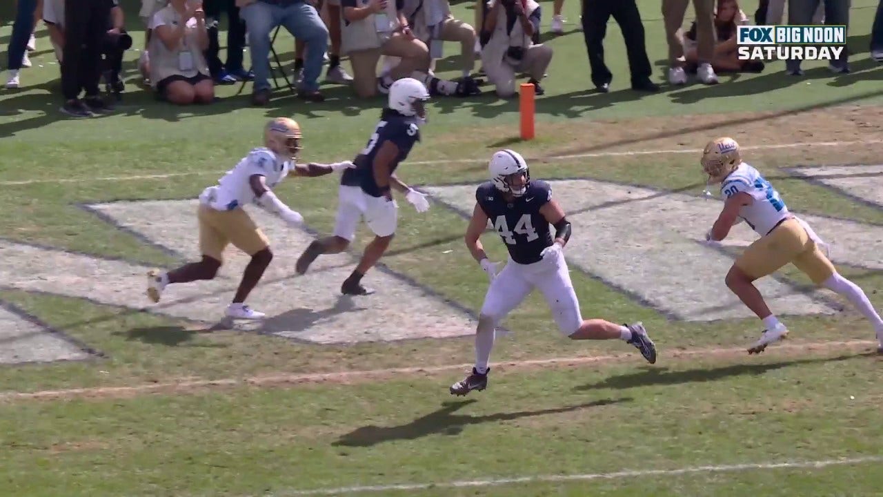 Penn State's Drew Allar connects with Tyler Warren for a five-yard touchdown vs. UCLA