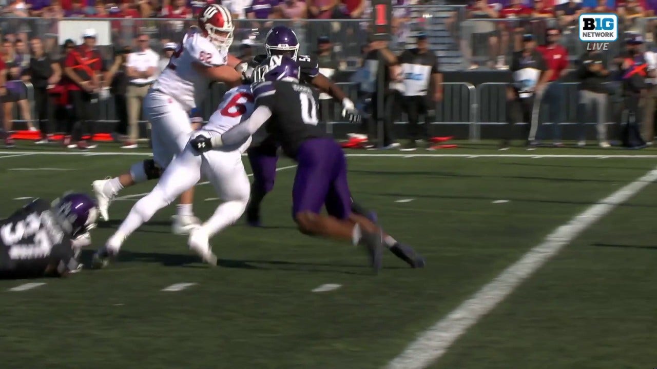 Justice Ellison bulldozes his way past Northwestern's defense on a five-yard rushing TD as Indiana strikes first