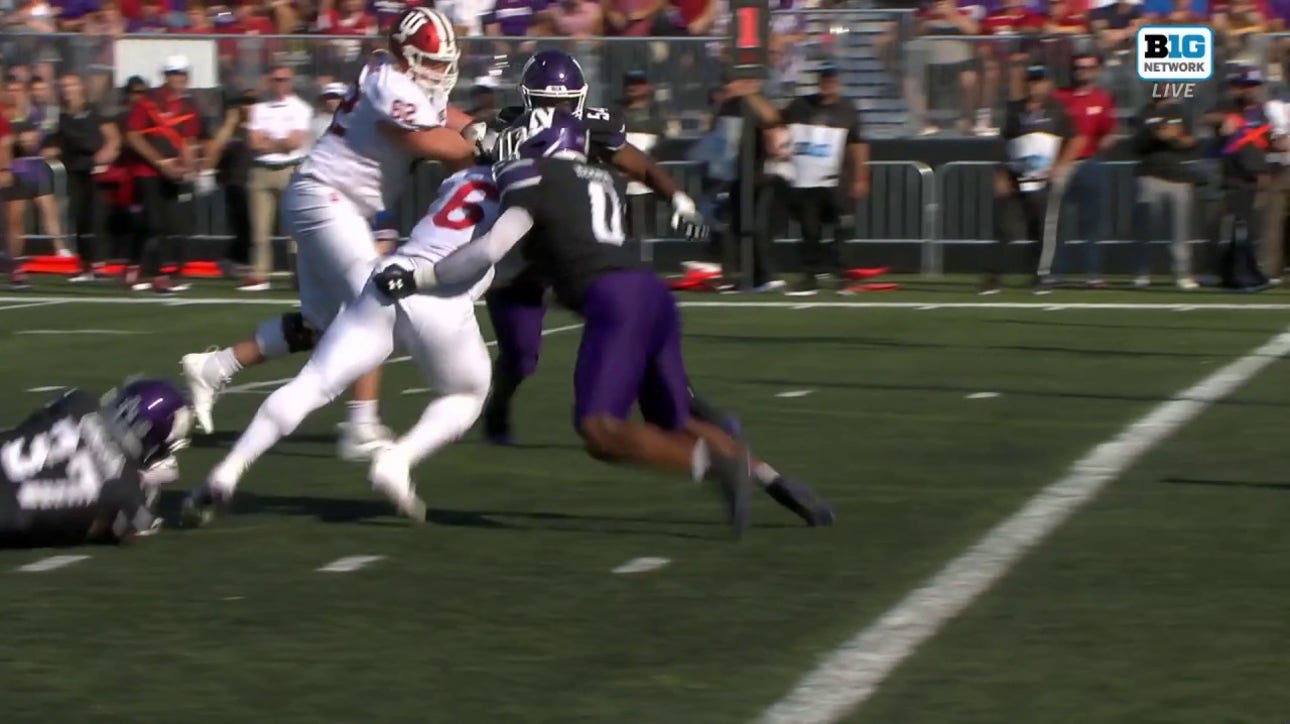 Justice Ellison bulldozes his way past Northwestern's defense on a five-yard rushing TD as Indiana strikes first