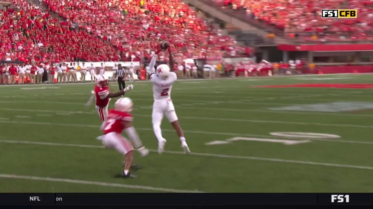 Rutgers' Ben Black catches a deflected pass for an 11-yard touchdown to shrink Nebraska's lead