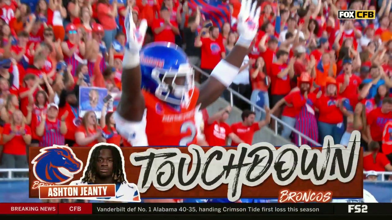 Ashton Jeany rushes for his third touchdown of the game, extending Boise State's lead over Utah State