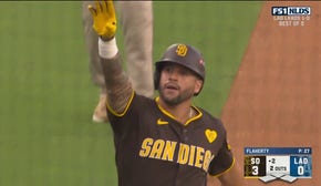 Padres' David Peralta smacks a long home run to center field, a two-run blast against the Dodgers 