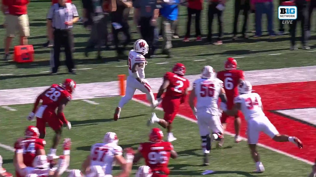 Tawee Walker scores on a nine-yard rushing TD, extending Wisconsin's lead to 28-0 over Rutgers