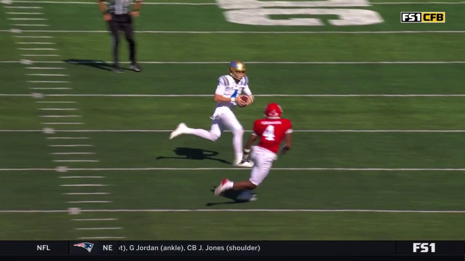 UCLA's Ethan Garbers rushes for a 49-yard touchdown vs. Rutgers