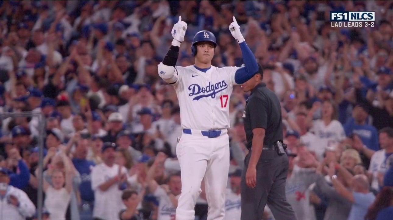 Shohei Ohtani flares a single to center field, increasing the Dodgers' lead over the Mets