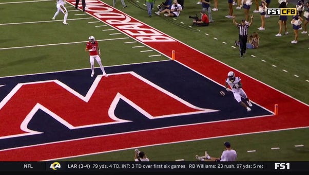 CJ Donaldson Jr. sprints past Arizona's defense on a 20-yard TD to give West Virginia a 24-7 lead