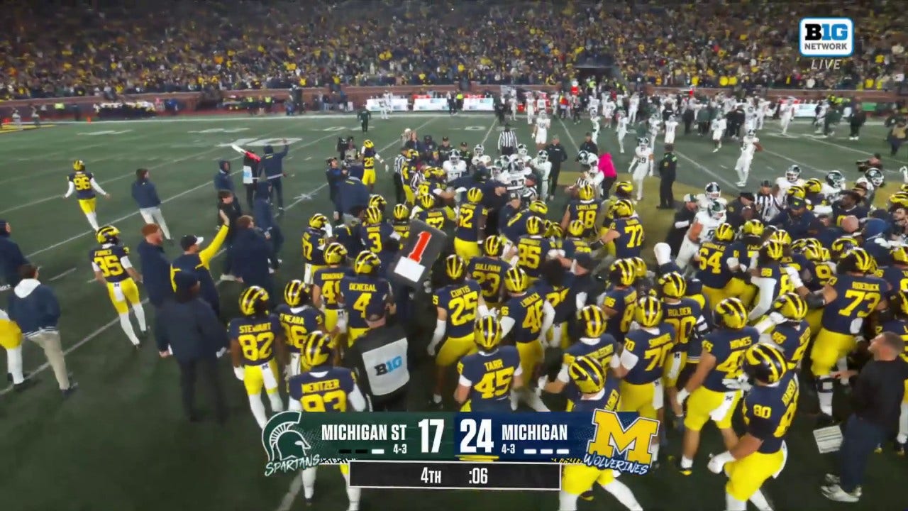 Rivals Michigan and Michigan State break out into massive brawl at the end of the Wolverines' 24-17 victory