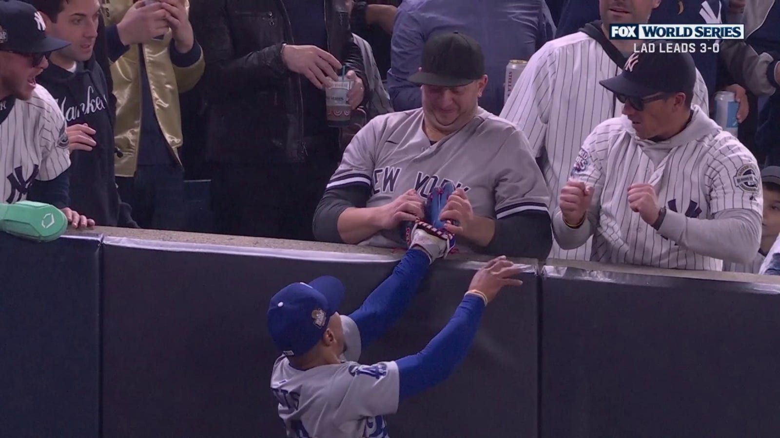 Yankees fan pulls the ball out of Mookie Betts' glove in Game 4