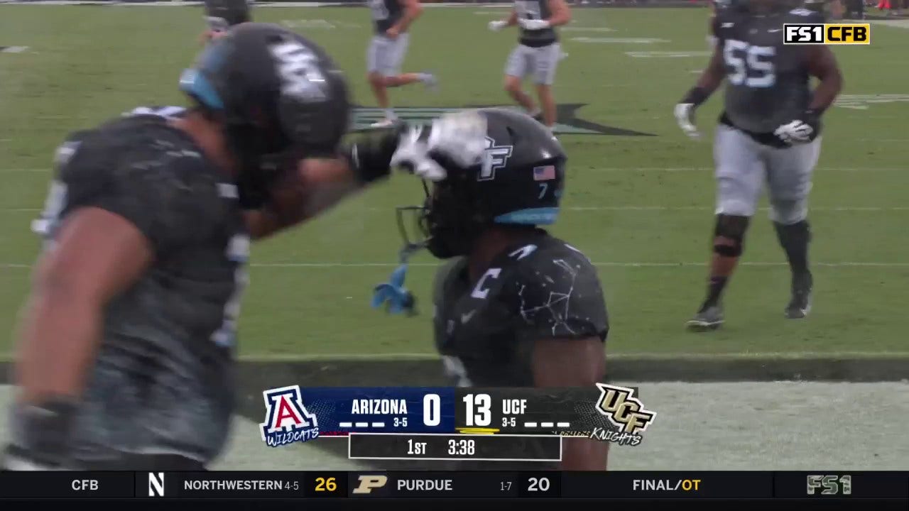 UCF's RJ Harvey rushes for a 17-yard touchdown vs. Arizona