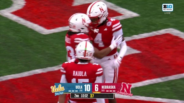 Nebraska's Dante Dowdell trucks into the end zone to shrink UCLA's lead