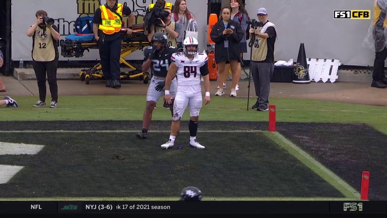 Arizona's Noah Fifita finds Sam Olson for a 23-yard touchdown vs. UCF