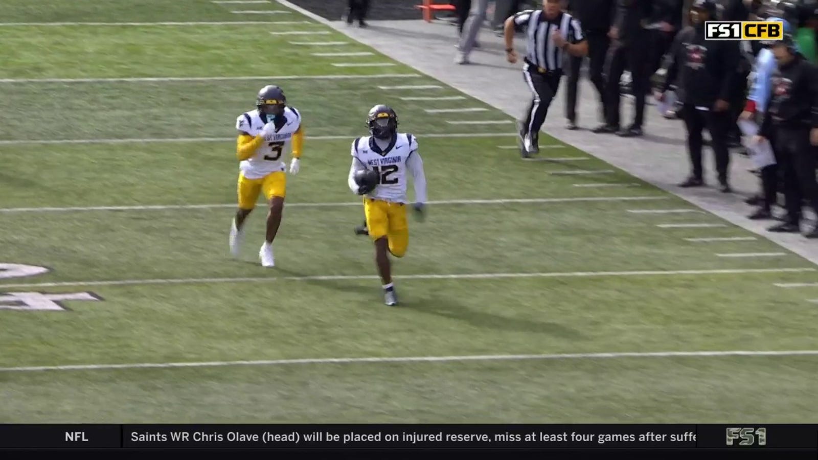 West Virginia's Anthony Wilson Jr. returns a 79-yard pick-six vs. Cincinnati