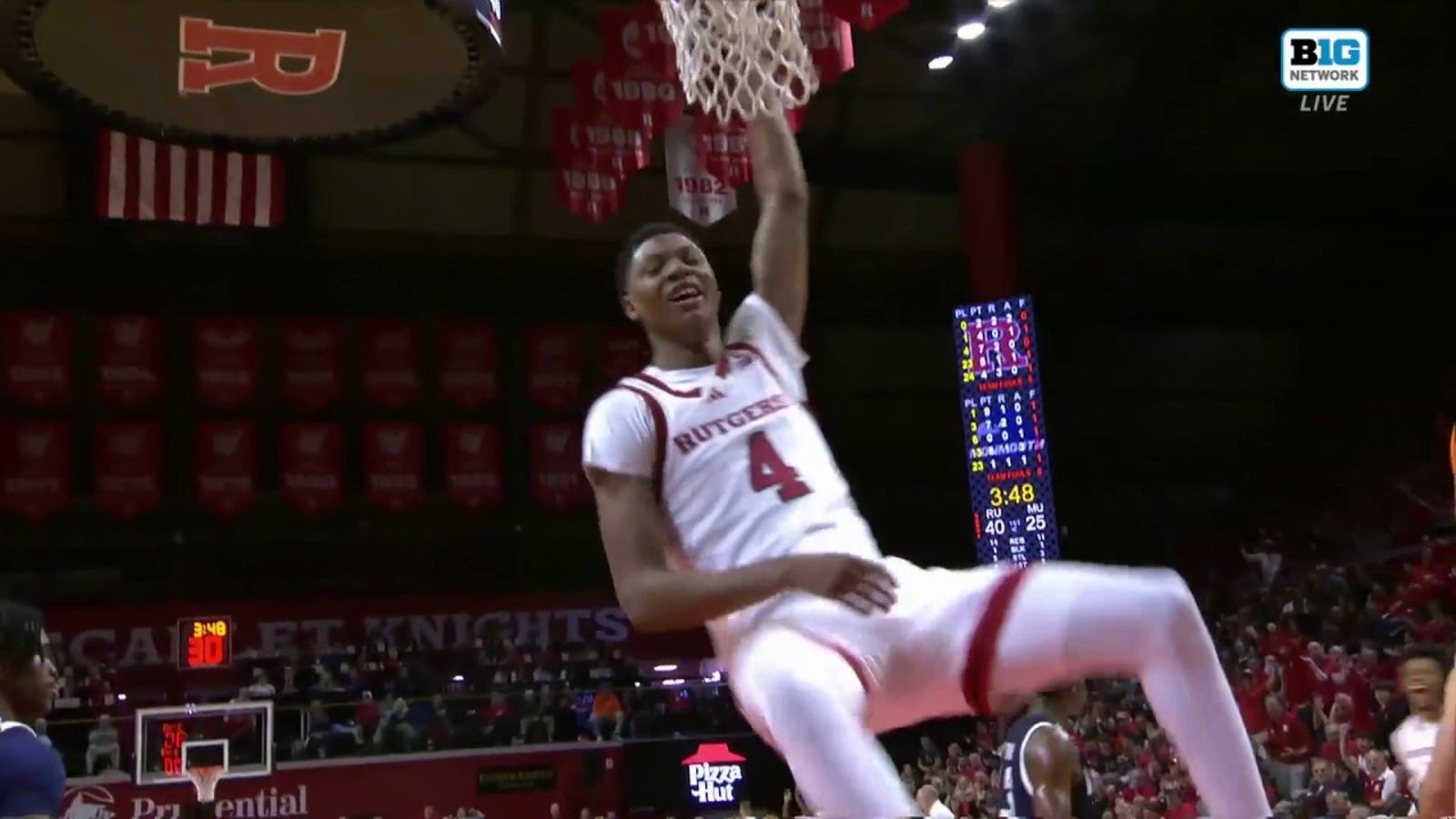 Rutgers' Ace Bailey finishes an alley-oop from an inbound pass vs. Monmouth