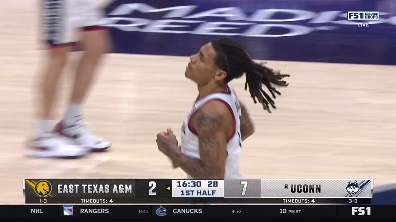  Alex Karaban's steal sets up Solo Ball for a powerful two-handed dunk as UConn leads East Texas A&M