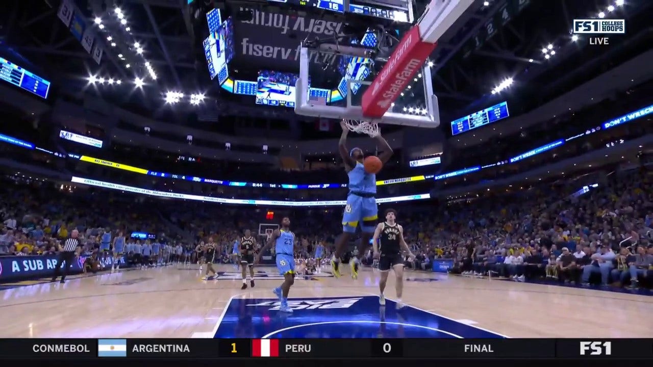 Chase Ross gets the steal and throws down a two-handed jam as Marquette leads 18-15 over Purdue