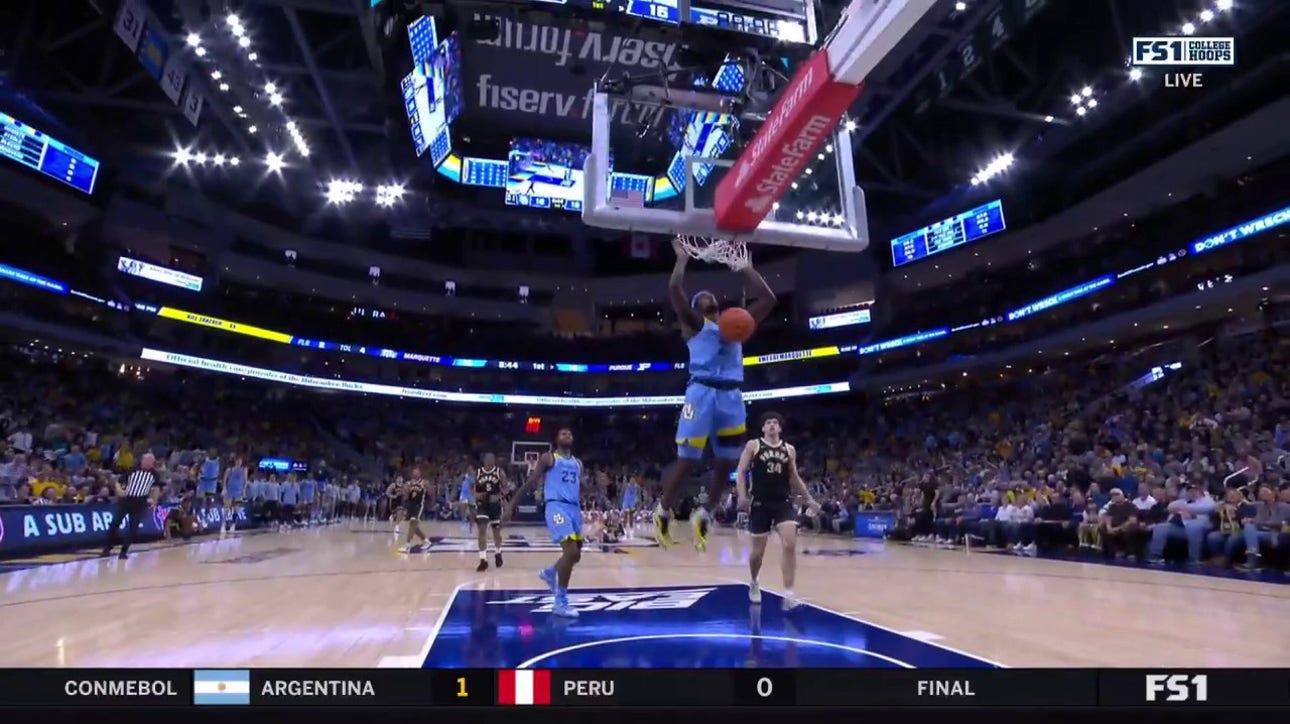 Chase Ross gets the steal and throws down a two-handed jam as Marquette leads 18-15 over Purdue