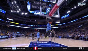 Chase Ross gets the steal and throws down a two-handed jam as Marquette leads 18-15 over Purdue