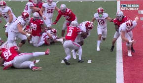 Ty Son Lawton bulldozes past Ohio State's defense on a 2-yard rushing TD as Indiana strikes first