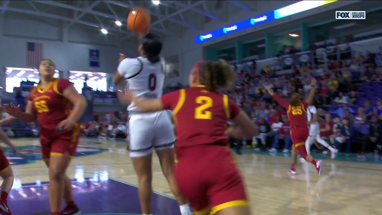 Te-Hina Paopao finishes a reverse layup, extending South Carolina's lead over Iowa State