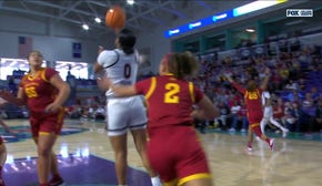 Te-Hina Paopao finishes a reverse layup, extending South Carolina's lead over Iowa State