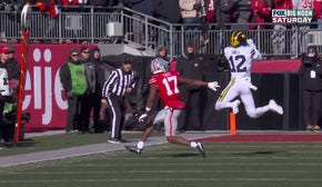 Aamir Hall's WILD interception helps Kalel Mullings punch it in on 1-yard rushing TD as Michigan strikes first vs. Ohio State