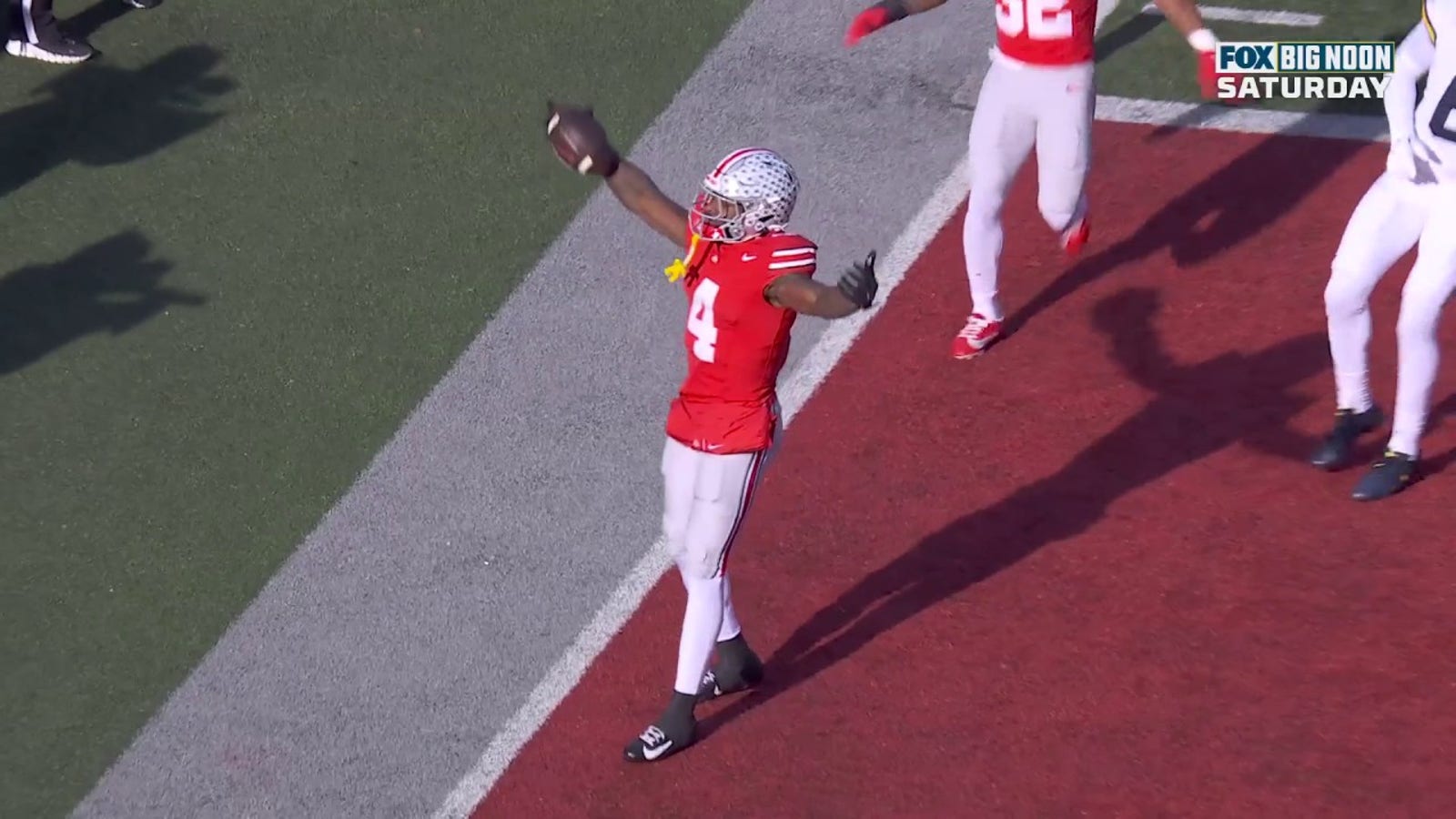 Ohio State's Will Howard connects with Jeremiah Smith for a 10-yard touchdown against Michigan