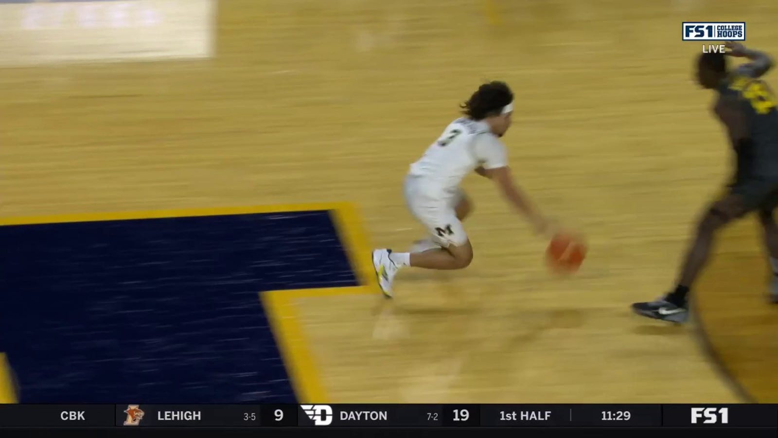 Michigan's Tre Donaldson pulls off a WILD shammgod en route to acrobatic finish against Iowa